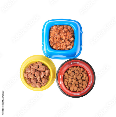 Dry and wet pet food in feeding bowls isolated on white  top view