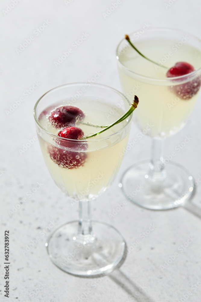 Lemon sparkling water with cherries Lemon sparkling water with cherries