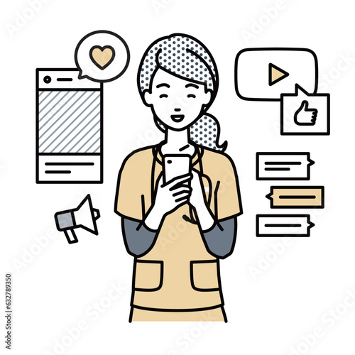 a nurse woman enjoying communication via various social network and messenger standing and looking in smart phone in her hands