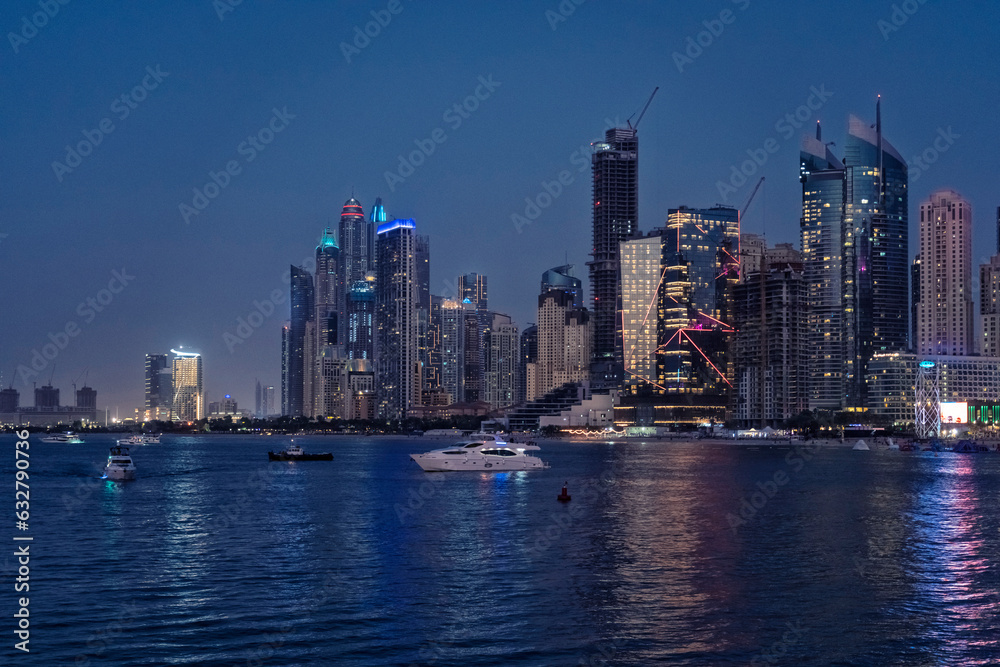 Cityscape of Marina Dubai with Marina Beach at night, UAE