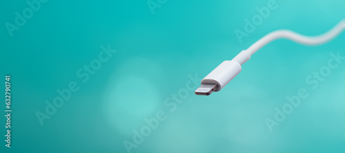 white cable to charge or transmit data from a mobile phone