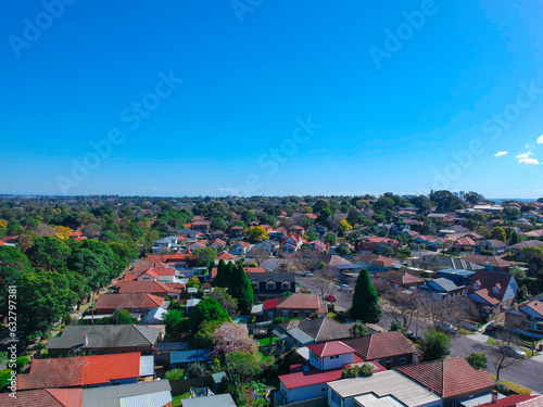 Drown view looking down on sydney residential houses in Sydney suburbia suburban house roof tops and streets NSW Australia 