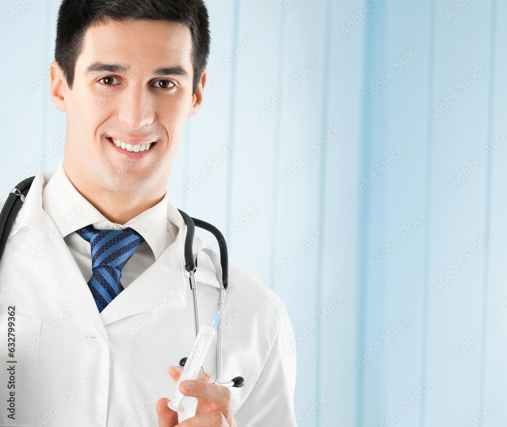 Portrait of cheerful doctor with syringe Portrait of cheerful doctor with syringe