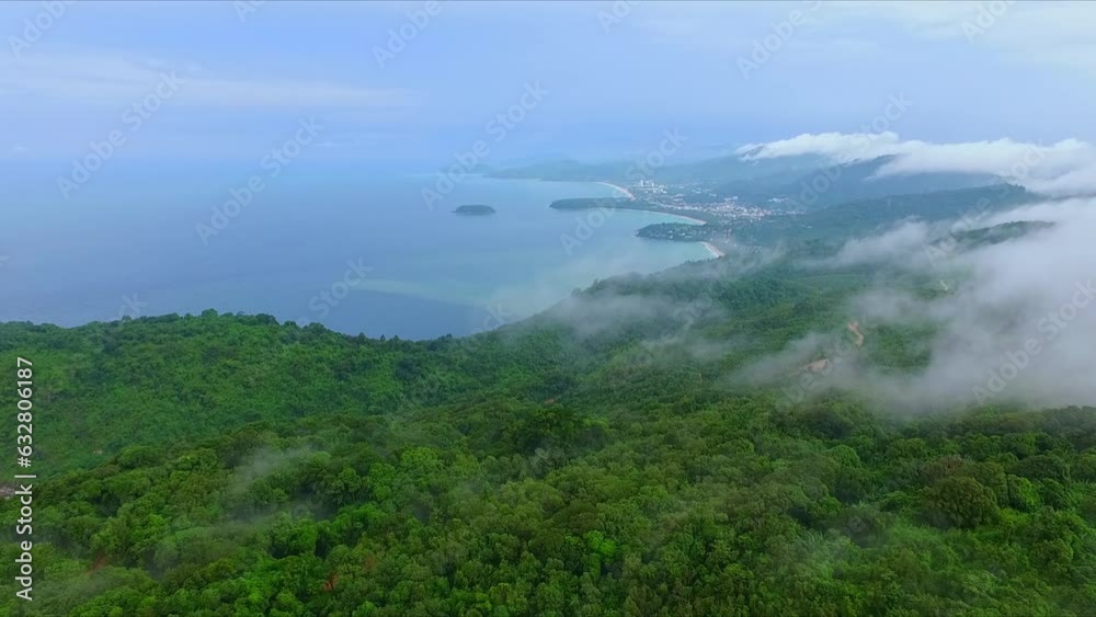 Aerial view Mist hovered over the mountains at three beaches viewpoint..scenery islands in blue sea. beautiful white sand beaches along Phuket island..The beauty of nature and the perfect city.. Aerial view Mist hovered over the mountains at three beaches viewpoint..scenery islands in blue sea. beautiful white sand beaches along Phuket island..The beauty of nature and the perfect city..