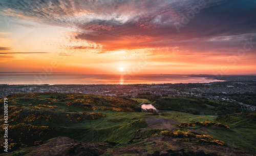 The view of the Holyrood Park and the habour area of Edinburgh in the sunrise  photo