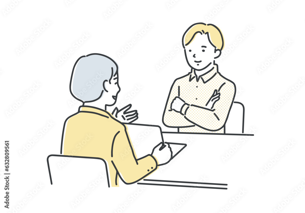 担当者の説明を聞く若い男性 担当者の説明を聞く若い男性