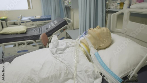 Raspatory training dummy for nursing training in hospital bed photo