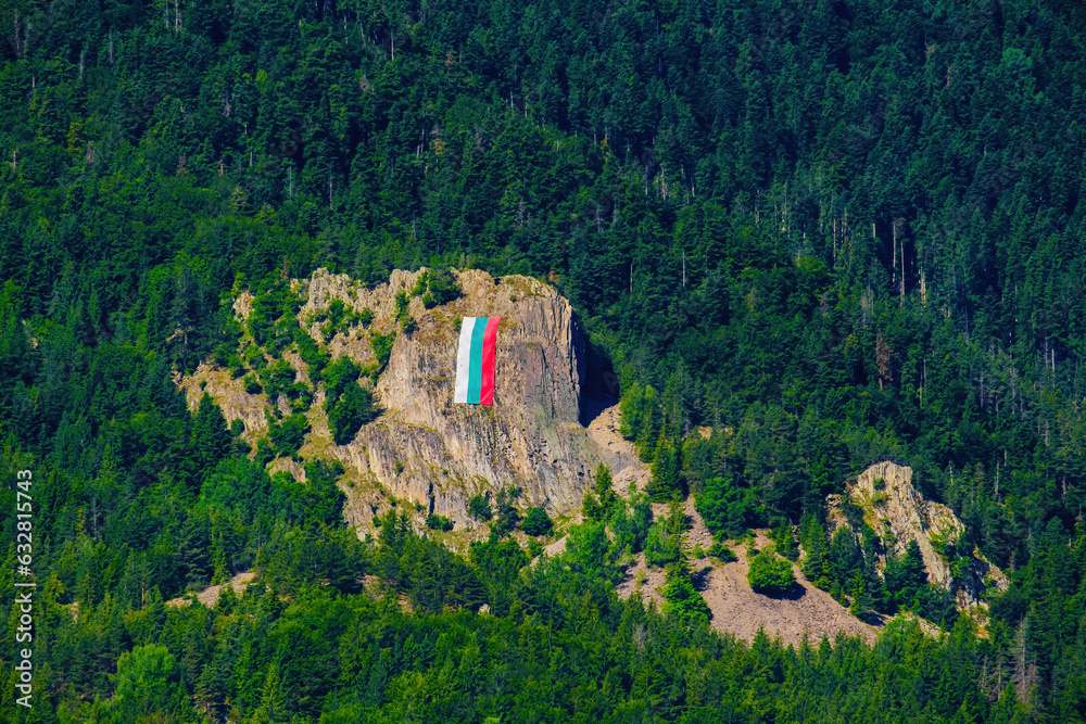 Beautiful landscape viewof Rhodope mountains with Bulgarian flag
