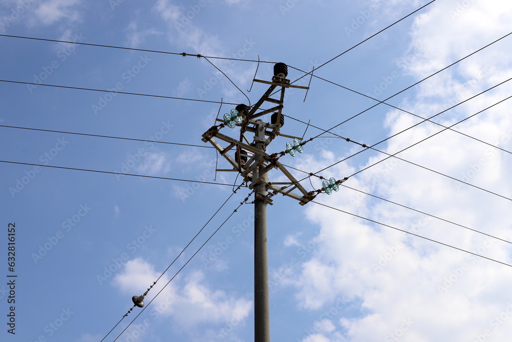 Power electric pole with line wires on insulators. Power electric pole with line wires on insulators.