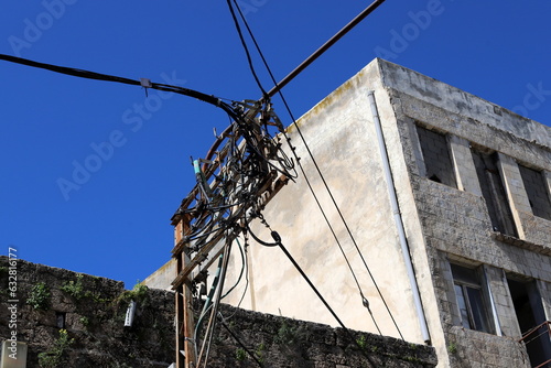 Fototapeta Naklejka Na Ścianę i Meble -  Power electric pole with line wires on insulators.