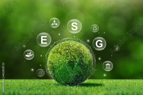 A green ball with ESG icon for Environment Social and Governance surrounds an idea for a sustainable and ethical business on the Network connection. ESG and World sustainable environment concept.