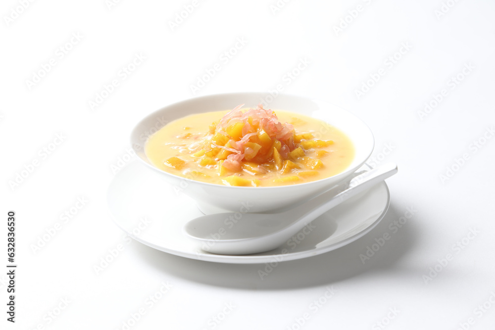 chilled mango sago fruit with pomelo and soya pudding jelly in white bowl on clean background sweet dessert pastry menu for Hong Kong cafe