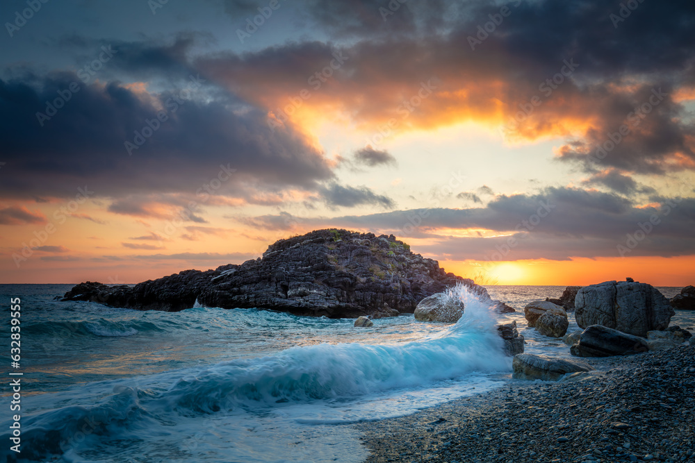 Obraz premium Seascape. Sea Ocean Morning. Wave hit the rock at beach, sea water splash up to the sky with sun. Sunset Sundown at Sea. Storm. Seascape. Nature Background