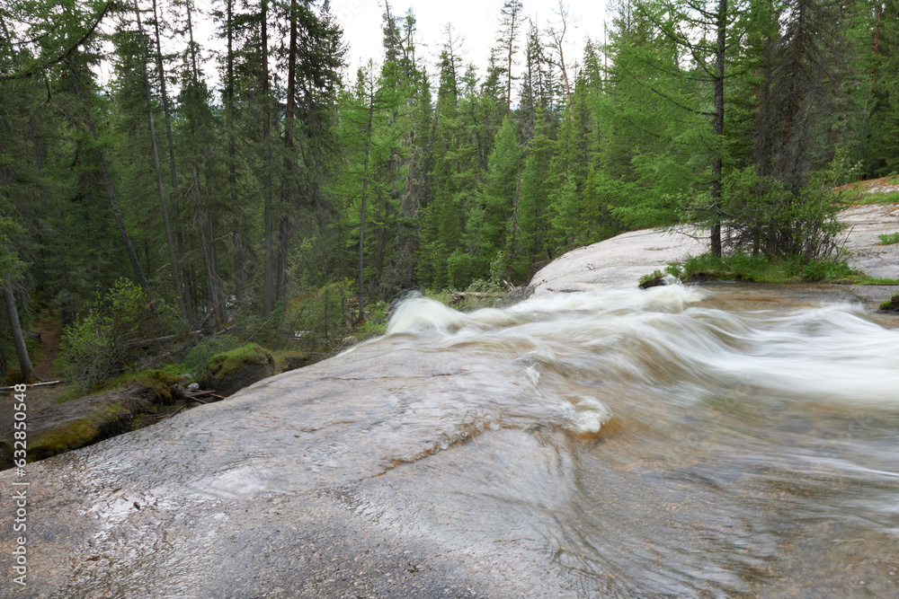 Waterfall in the forest, Gorny Altai. Nature of Altai, hiking.