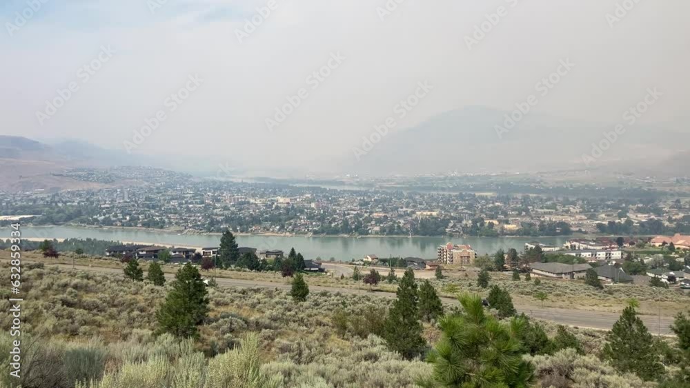 Smoke's Embrace: Kamloops' Altered Cityscape due to Ross Moore Lake Wildfire Smoke's Embrace: Kamloops' Altered Cityscape due to Ross Moore Lake Wildfire
