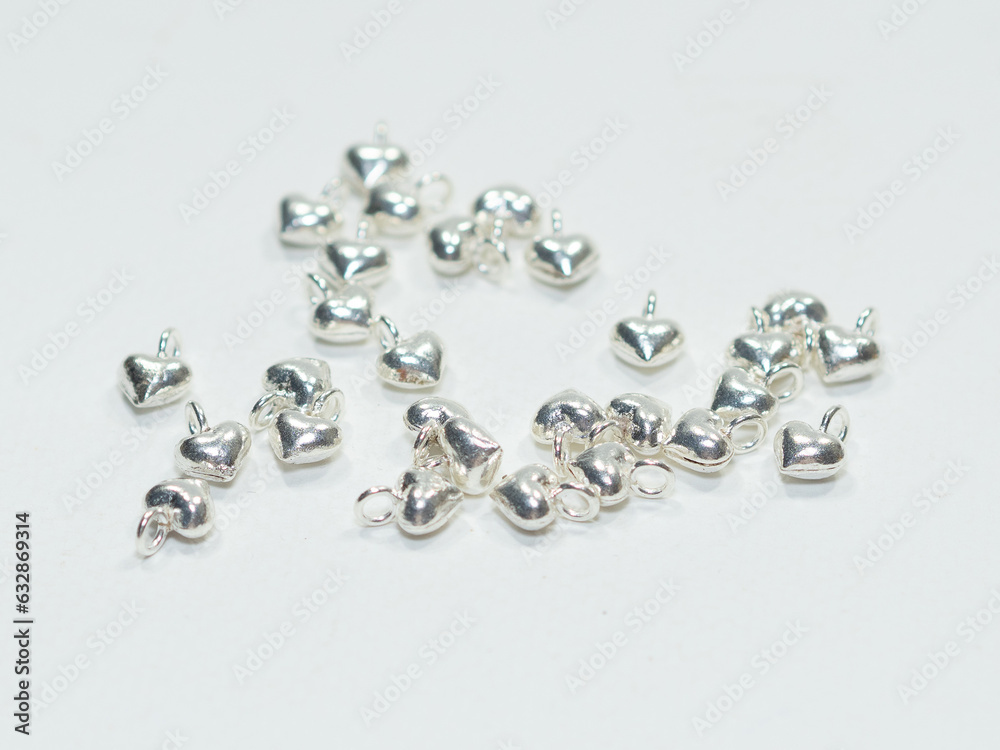 Silver jewelry and gemstone on white background Silver jewelry and gemstone on white background