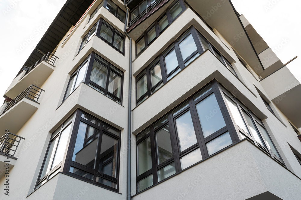 Part of a high-rise, modern architecture of a residential building Part of a high-rise, modern architecture of a residential building