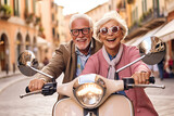 Happy senior couple riding a scooter in the street