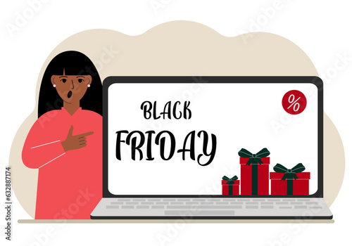 A woman next to a large laptop, on his screen the text black friday and a lot of gift boxes.