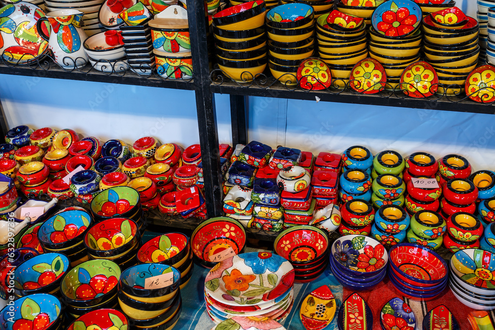Colorful handcrafted pottery on display