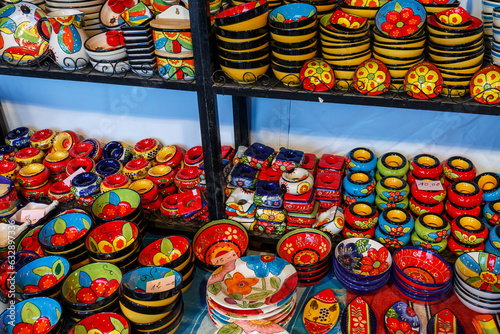 Colorful handcrafted pottery on display