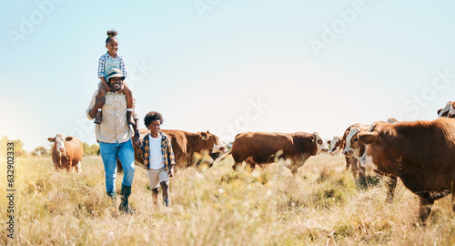 Cattle farm, father and children or family outdoor for travel, sustainability and holiday. Black man and kids walking on a field for farmer adventure in countryside with cows and banner in Africa
