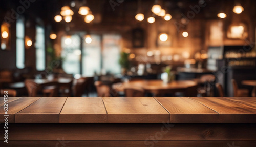 Empty wooden table top with blur background of indoor vintage cafe, cozy enviroment
