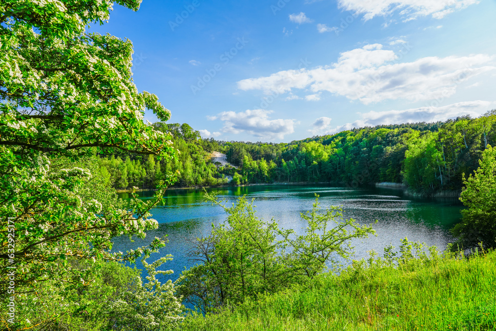 Jezioro Turkusowe near Wapnica. Lake in Wolin National Park in Poland. Idyllic landscape with green nature by the lake. Turquoise lake. 
