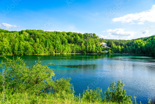 Jezioro Turkusowe near Wapnica. Lake in Wolin National Park in Poland. Idyllic landscape with green nature by the lake. Turquoise lake. 
 photo