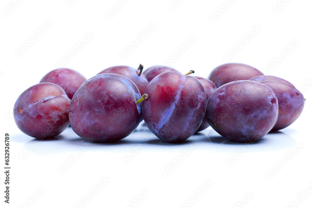scattered ripe purple plums isolated on white background