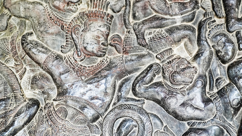 Wall carving of Khmer Culture in Ancient ruins Angkor Wat temple - famous Cambodian landmark. Siem Reap, Cambodia.