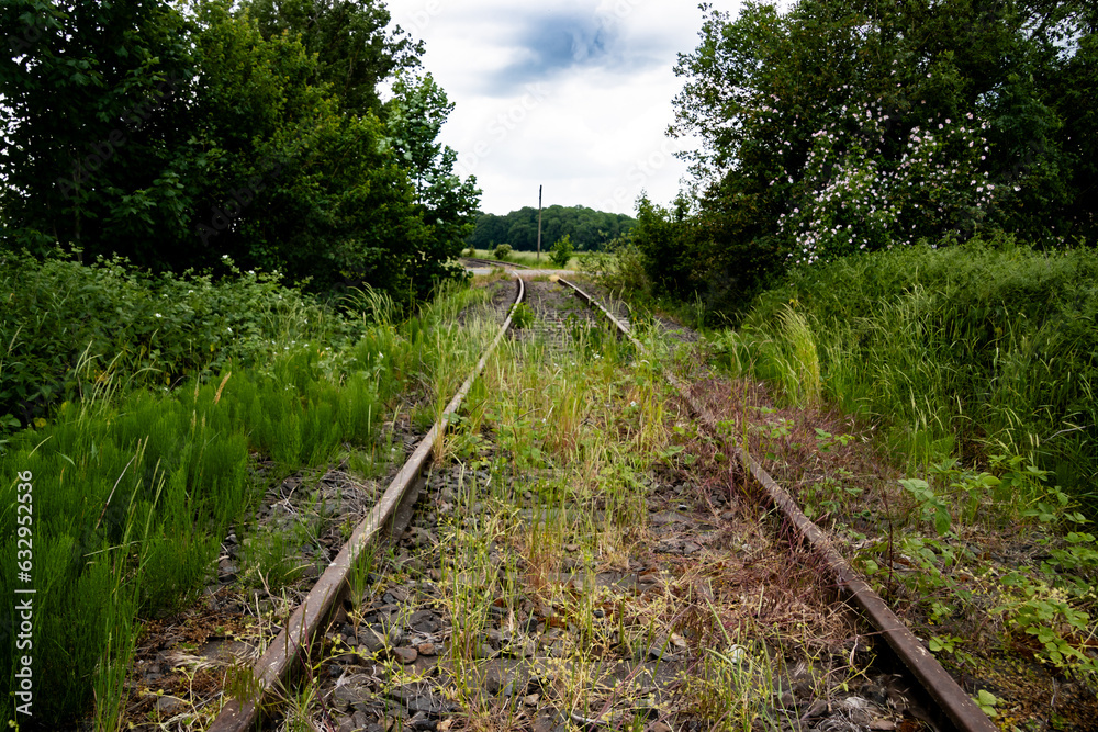 Low angle view of abandoned railroad tracks Low angle view of abandoned railroad tracks