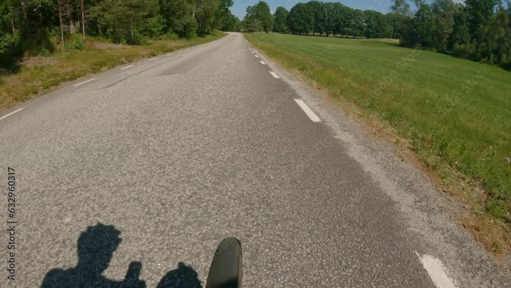 Carbon fiber Racer bike in the countryside roads of Sweden. Front wheel spinning around rond in Sweden Ljungby Kronoberg. 