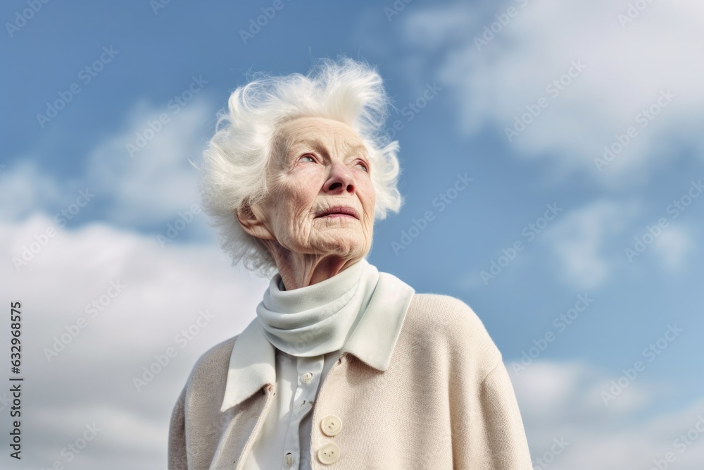 Medium shot portrait photography of a woman in her 90s appearing weakened and pale because of anemia wearing a chic cardigan against a sky background Medium shot portrait photography of a woman in her 90s appearing weakened and pale because of anemia wearing a chic cardigan against a sky background