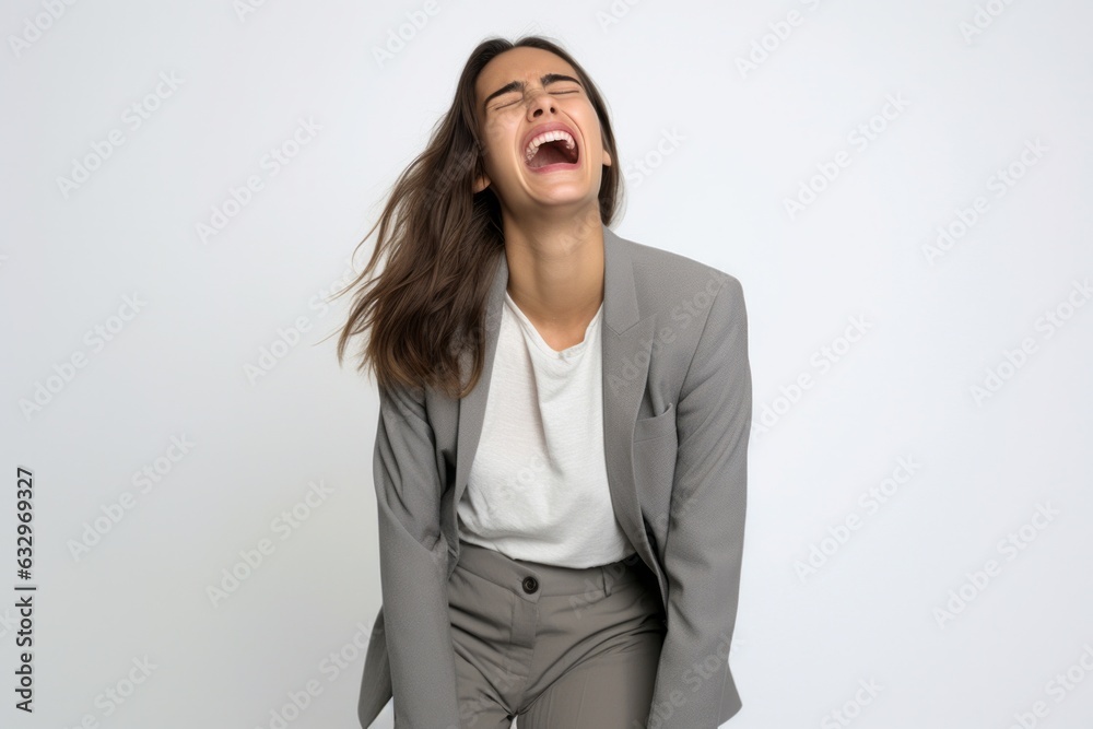 Medium shot portrait photography of a woman in her 20s wincing with pain due to a kidney stone wearing a sleek suit against a white background Medium shot portrait photography of a woman in her 20s wincing with pain due to a kidney stone wearing a sleek suit against a white background