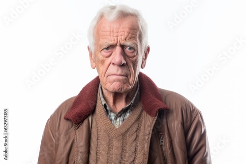 Group portrait photography of a man in his 80s appearing tired and down due to hypothyroidism wearing a chic cardigan against a white background 