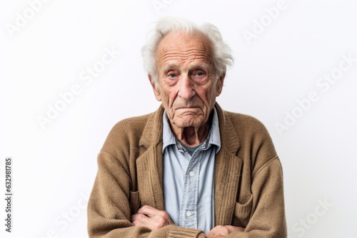 Group portrait photography of a man in his 90s visibly in discomfort and fatigue from an autoimmune disease like lupus wearing a chic cardigan against a white background 