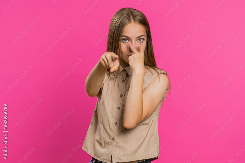 I am watching you. Young confident woman pointing at her eyes and camera, show I am watching you gesture, spying on someone. Pretty attractive blonde girl isolated alone on pink studio background I am watching you. Young confident woman pointing at her eyes and camera, show I am watching you gesture, spying on someone. Pretty attractive blonde girl isolated alone on pink studio background