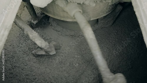 mixing concrete mixture in a large mixer 50fps Slow motion
