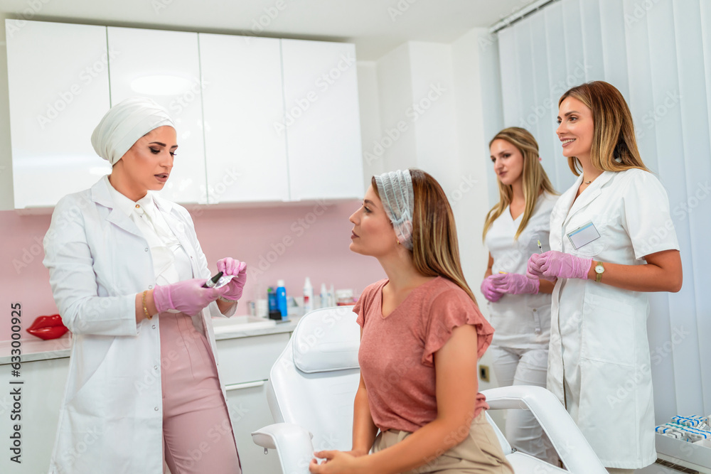 Fototapeta premium A doctor is explaining to a patient what aesthetic procedure will she be doing