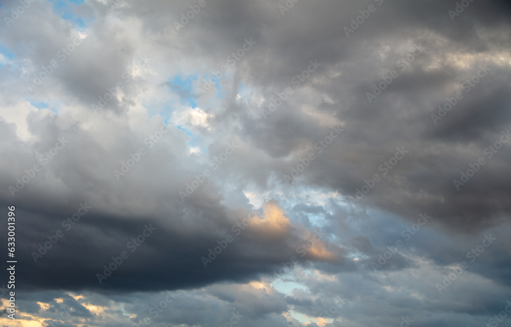 Thunderclouds in the sky at sunset. Thunderclouds in the sky at sunset.