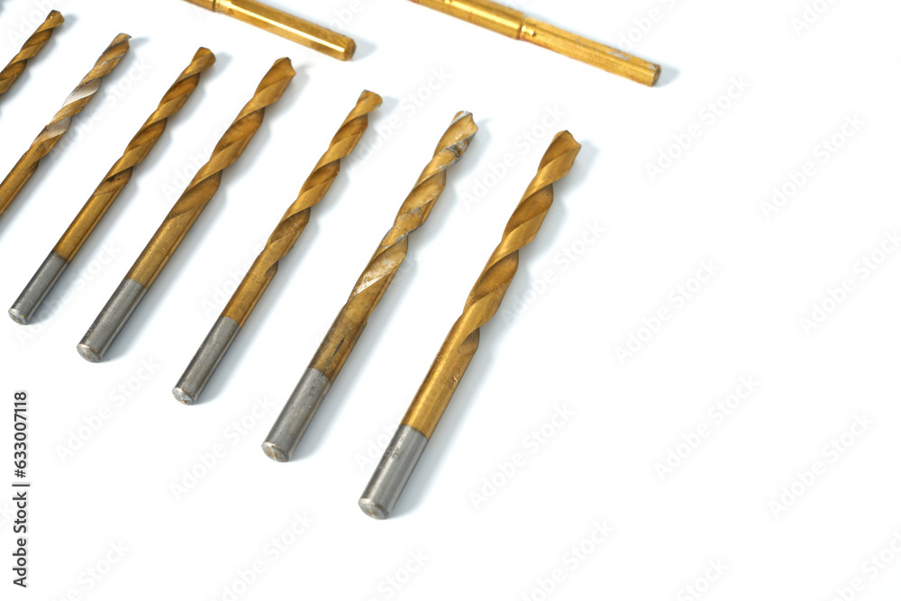 Stainless steel drill bits on a white isolated background Stainless steel drill bits on a white isolated background