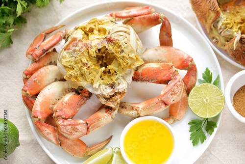 Boiled crab with lime juice butter sauce and garlic.