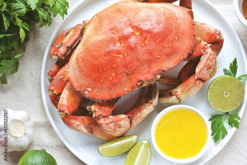 Boiled crab with lime juice butter sauce and garlic.
