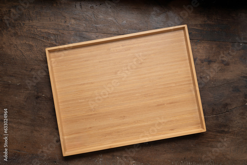 empty tray on wooden table