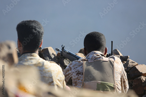 A Yemeni soldier fights in the ranks of the legitimate army against the Houthi militia in the Taiz City, Yemen.	