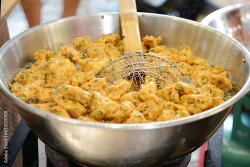 fried fish-paste balls at street food market in Bangkok, Thailand