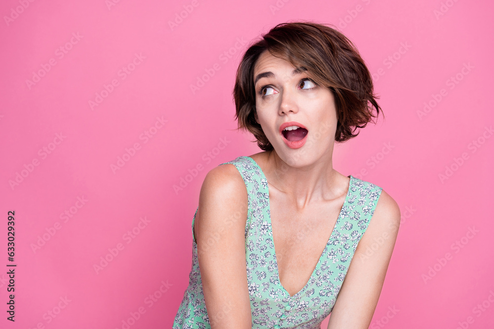 Portrait of impressed nice girl open mouth look interested speechless empty space isolated on pink color background Portrait of impressed nice girl open mouth look interested speechless empty space isolated on pink color background
