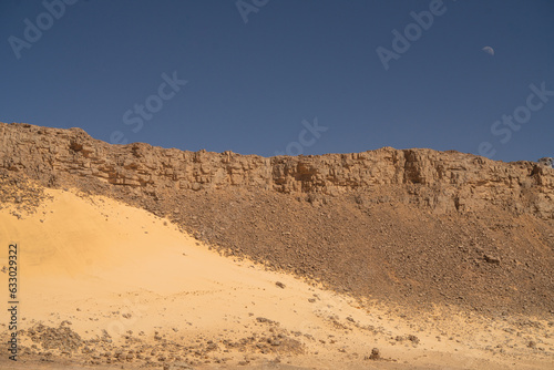 view in the Sahara desert of Tadrart rouge tassili najer in Djanet City  ,Algeria.colorful orange sand, rocky mountains photo