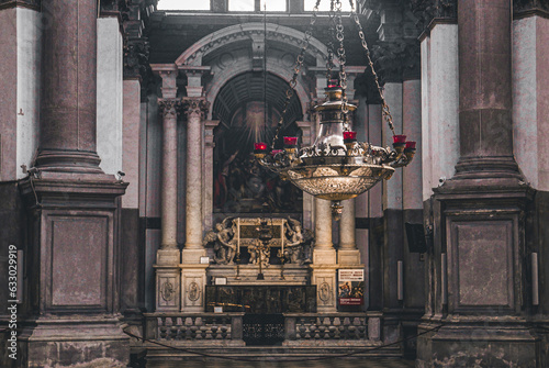 Photography interior of a church with altar and chandelier
